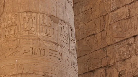 The stone columns with relief carving in Ancient Egyptian temple complex. Stock Footage 87300379