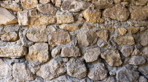 Stone-concrete wall as a background texture Stock Photos
