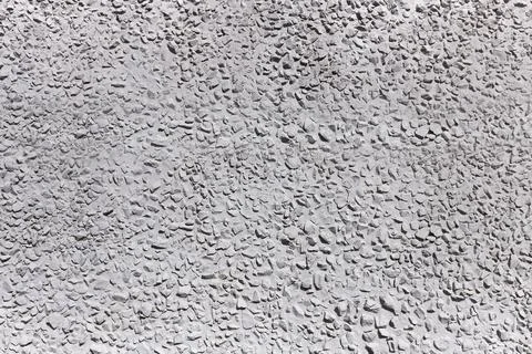 Stone concrete wall of gray color, the background, close up Stock Photos