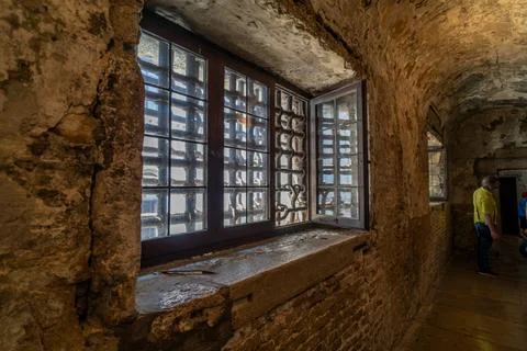 Stone Corridor with Barred Windows Stock Photos
