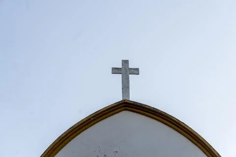 Stone cross located in the highest part of the hermitage with the sky in th.. Stock Photos