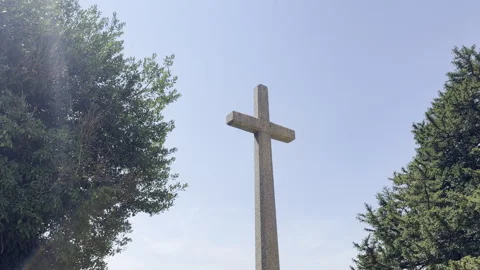 Stone cross memorial against clear sky detail Stock Footage 340195386