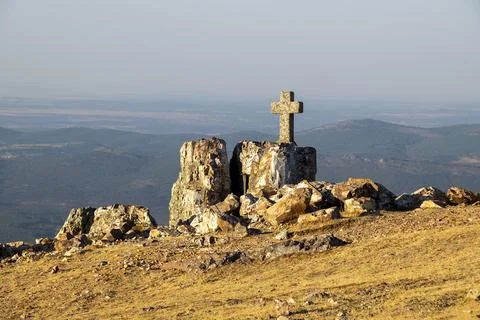 Stone cross monument on summit, pea de francia, spain Stock Photos