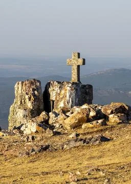 Stone cross monument on summit, pea de francia, spain Stock Photos