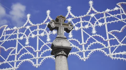 Stone cross over the blue sky Video stock 263961639