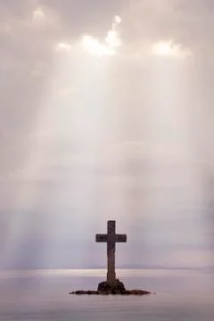 Stone cross Stock Photos