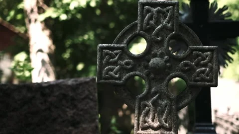 Stone cross at a tomb Stock Footage 209231380