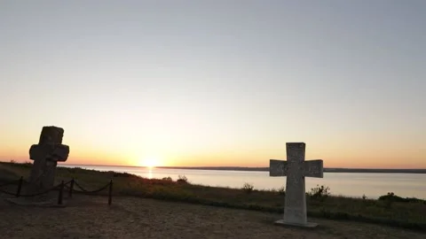 Stone crosses at sunrise Stock Footage 236178109