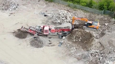 Stone Crusher Crushing Concrete at Processing Plant Grading Stone With Heavy Mac Stock Footage 186840784