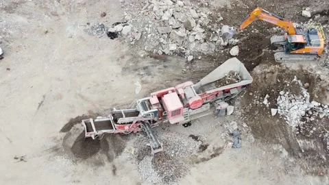 Stone Crusher Crushing Concrete at Processing Plant Grading Stone With Heavy Mac Stock Footage 186842700