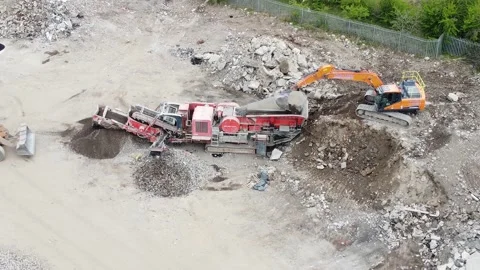 Stone Crusher Crushing Concrete at Processing Plant Grading Stone With Heavy Mac Stock Footage 186976001