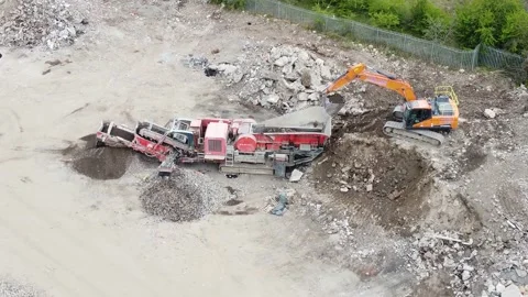 Stone Crusher Crushing Concrete at Processing Plant Grading Stone With Heavy Mac Stock Footage 186978849