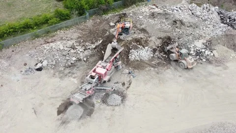 Stone Crusher Crushing Concrete at Processing Plant Grading Stone With Heavy Mac Stock Footage 186981217
