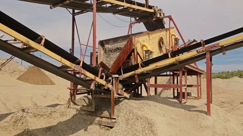 Stone crusher machine processing plant for crushed stone, sand and gravel Stock Footage 70353176