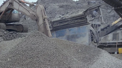 Stone crusher. Сreating a backing from waste for the highway 2 Stock Footage 99884310