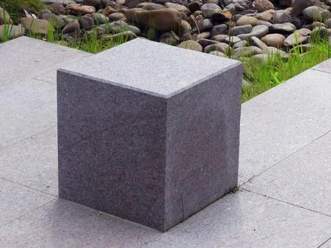 Stone cube structure at a botanical garden Stock Photos