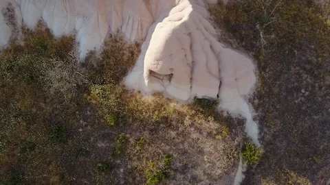 Stone-cut cave in White Pink rocks of Pancarlik Valley. Cappadocia. DJI_0009-01 Stock Footage 105352777