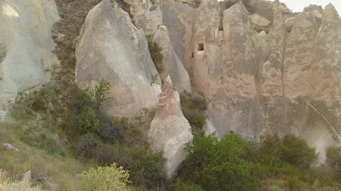 Stone-cut cave in White Pink rocks of Pancarlik Valley. Cappadocia.DJI_0011-01 Video stock 105354404