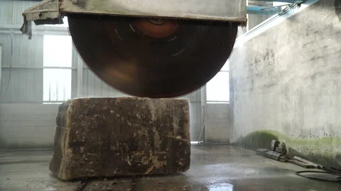 Stone cutting machine with a granite block Stock Footage 237340783