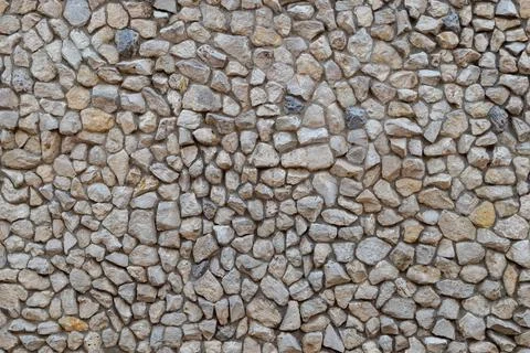Stone decorated mosaic wall flat seamless texture and full frame background, dry Stock Photos