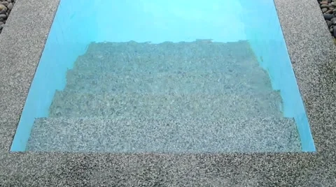 Stone decorating on the edge of the swimming pool Stock Footage 54189870