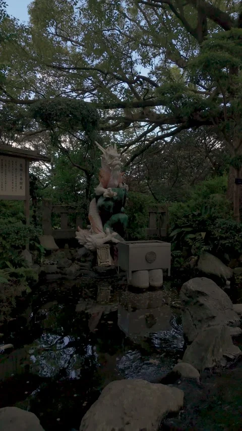 Stone dragon statue blending nature with artistry. Stock Footage 294733976