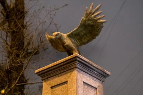 Stone eagle on column at night Stock Photos