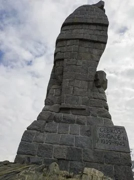 Stone eagle monument on the top of the mountain Stock Photos