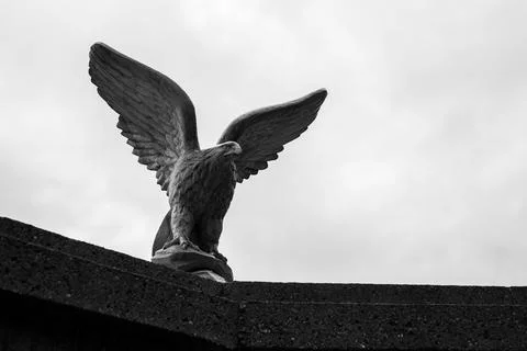 Stone eagle statue with sky as background Stock Photos