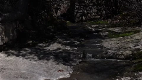 Stone edge of Stacy Brook running to Cole Bay. Westport, NY. Stock Footage 273607635