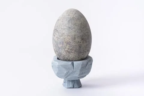 Stone Egg Holder with Dinosaur Egg 写真素材