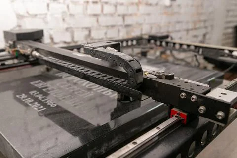 Stone engraving machine, perfect for creating intricate designs and personali Fotos Stock