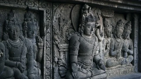 Stone engravings with buddha in ancient temple Stock Footage 146598930