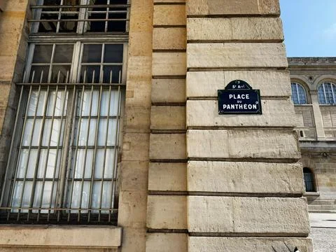 Stone facade and barred window at Place du Panthon, Paris, France  historic.. Stock Photos