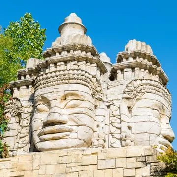 Stone faces of a temple. Stock Photos
