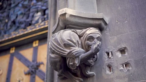 Stone figure at bottom of column of Munich historic city hall Stock Footage 281857868