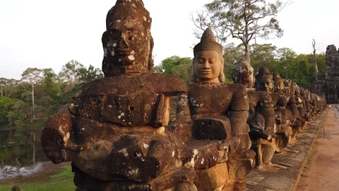 Stone figures, "giants" of the Asuras (evil spirits) and Devas (good spirits)  Stock Footage 105889944