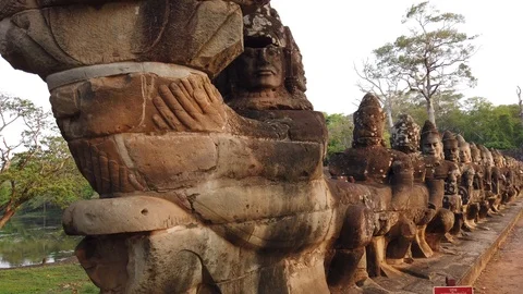 Stone figures, "giants" of the Asuras (evil spirits) and Devas (good spirits)  Stock Footage 105890040