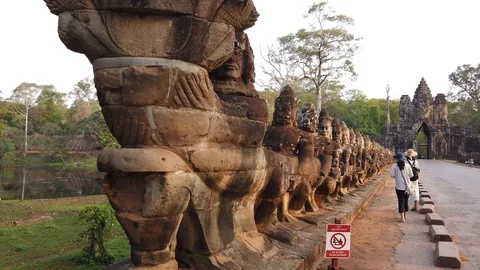 Stone figures, "giants" of the Asuras (evil spirits) and Devas (good spirits)  Stock Footage 105890055