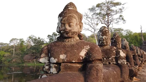 Stone figures, "giants" of the Asuras (evil spirits) and Devas (good spirits)  Stock Footage 105890958