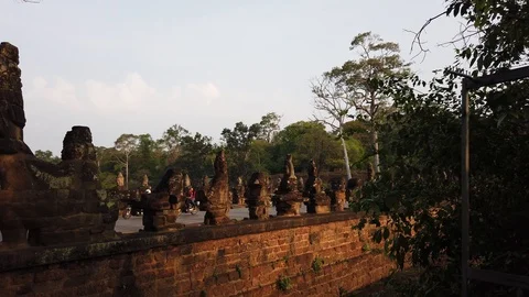 Stone figures of “giants” of asuras (evil spirits) and devas (good spirits)  Stock Footage 105891445