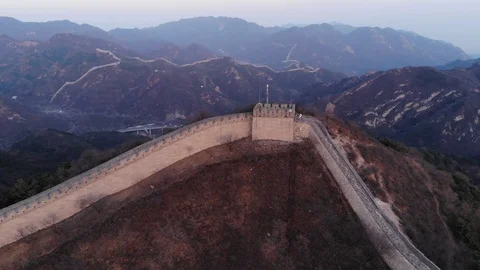 Stone fortification wall run over hill top, aerial shot of Great Wall of China Stock Footage 106120502
