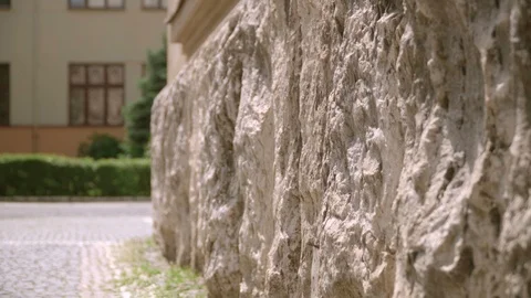 Stone Foundation of the building on the background of the sidewalk. The finished Stock Footage 109226844