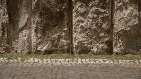 Stone Foundation of the building on the background of the sidewalk. The finished Stock Footage 109226924