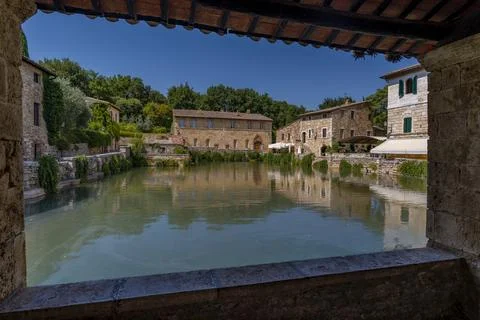 Stone-Framed Panoramic View of Spa Pool and Bathhouses Stock Photos