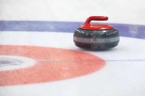 Stone for game in curling on ice Stock Photos