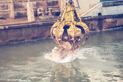 Stone grapple in action Stock Photos