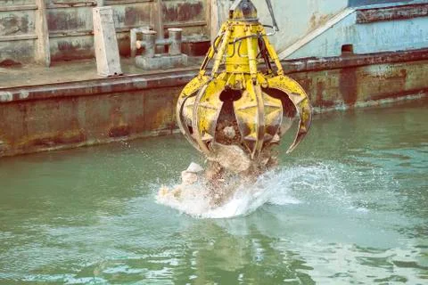 Stone grapple in action Stock Photos