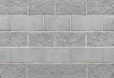Stone gray brick blocks wall background texture Stock Photos