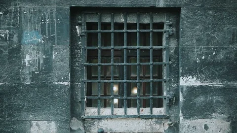 Stone grey wall with grid window Stock Footage 77887985